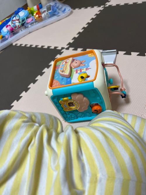 7-in-1 Activity Cube for Infants with Hand Beat Drum Puzzle and Music photo review