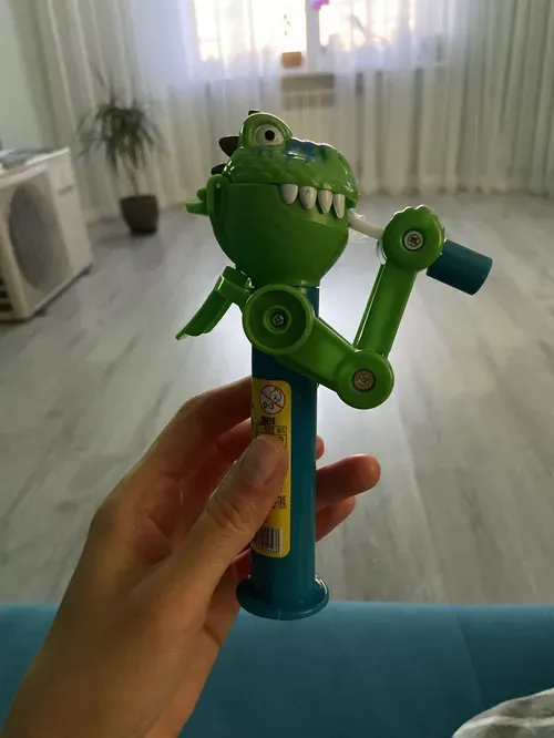 Creative Dinosaur Lollipop Robot Holder with Pop-Ups for Kids photo review