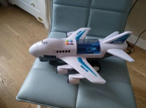 Interactive Kids Toys: Passenger Plane Car with Early Education Sound and Light Features photo review