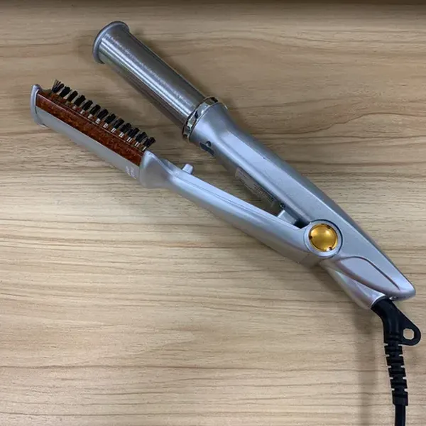 Professional 2 In 1 Rotating Iron Hair Brush photo review