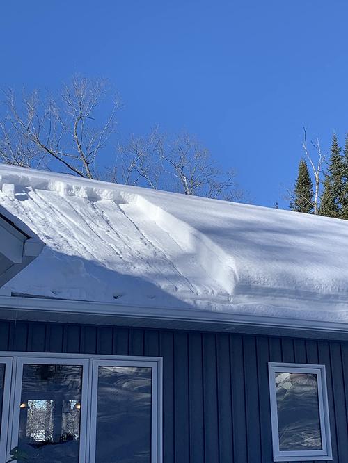 Snow Sweeping Tools On The Roof photo review