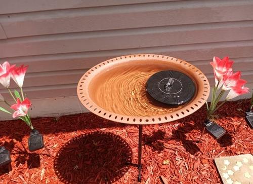 Solar Powered Fountain - A Beautiful and Sustainable Way to Add Life to Your Garden photo review