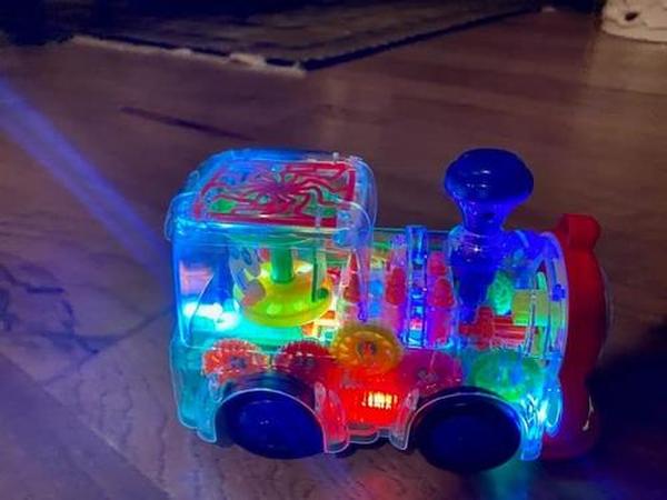 Transparent Electric Gear Train Toy with Flashing Lights and Music, Light Up Train Toys, Fun and Interactive Electric Train Toy photo review