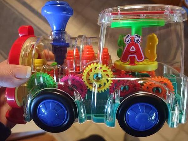 Transparent Electric Gear Train Toy with Flashing Lights and Music, Light Up Train Toys, Fun and Interactive Electric Train Toy photo review