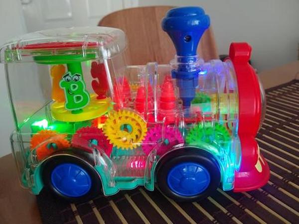 Transparent Electric Gear Train Toy with Flashing Lights and Music, Light Up Train Toys, Fun and Interactive Electric Train Toy photo review