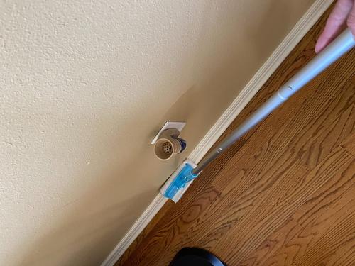 White Baseboard Buddy Multi-Use Cleaning Tool with Retractable Brush photo review